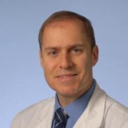 Dr Charles Kahi